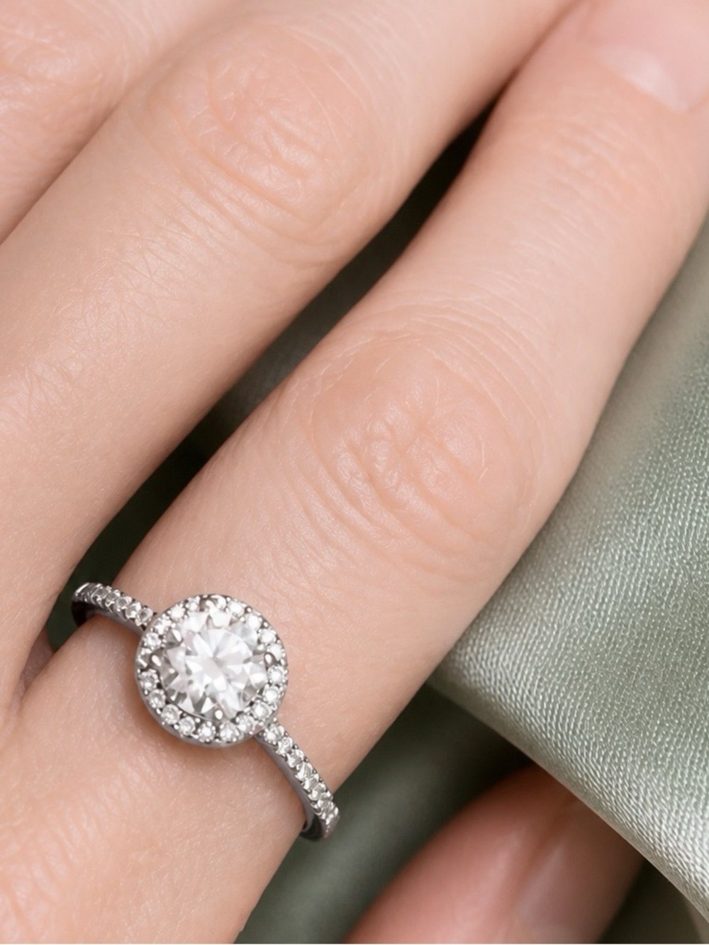 AAA 6mm Moissanite Solitaire with Moissanite Halo and Sides. Rhodium over S925.